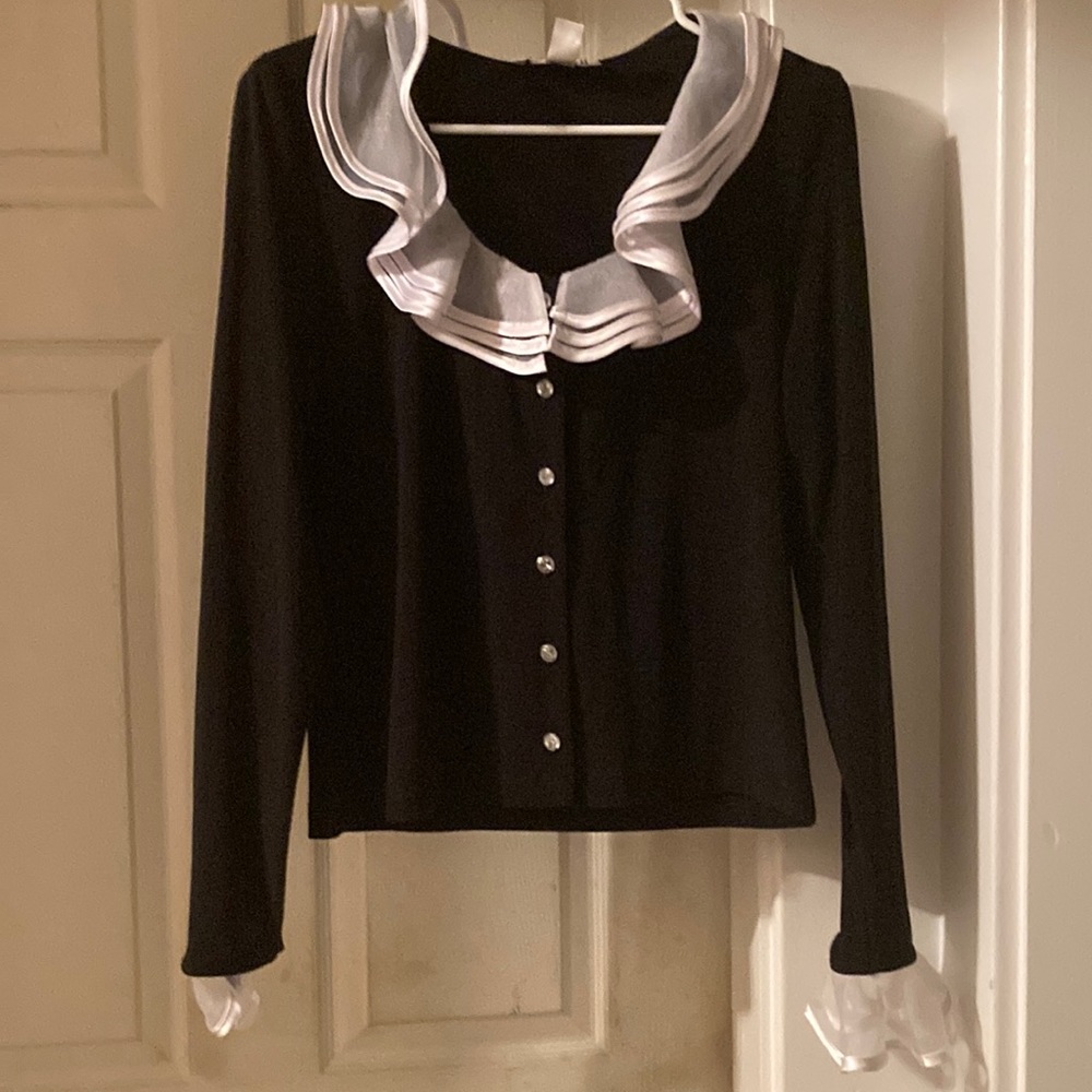 Blouse with sheer ruffled collar and whit ribbon